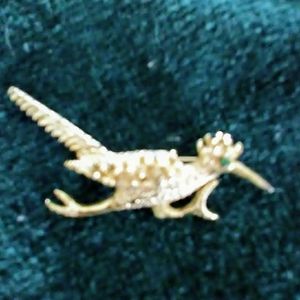 Vintage roadrunner brooch,  gold tone with green r